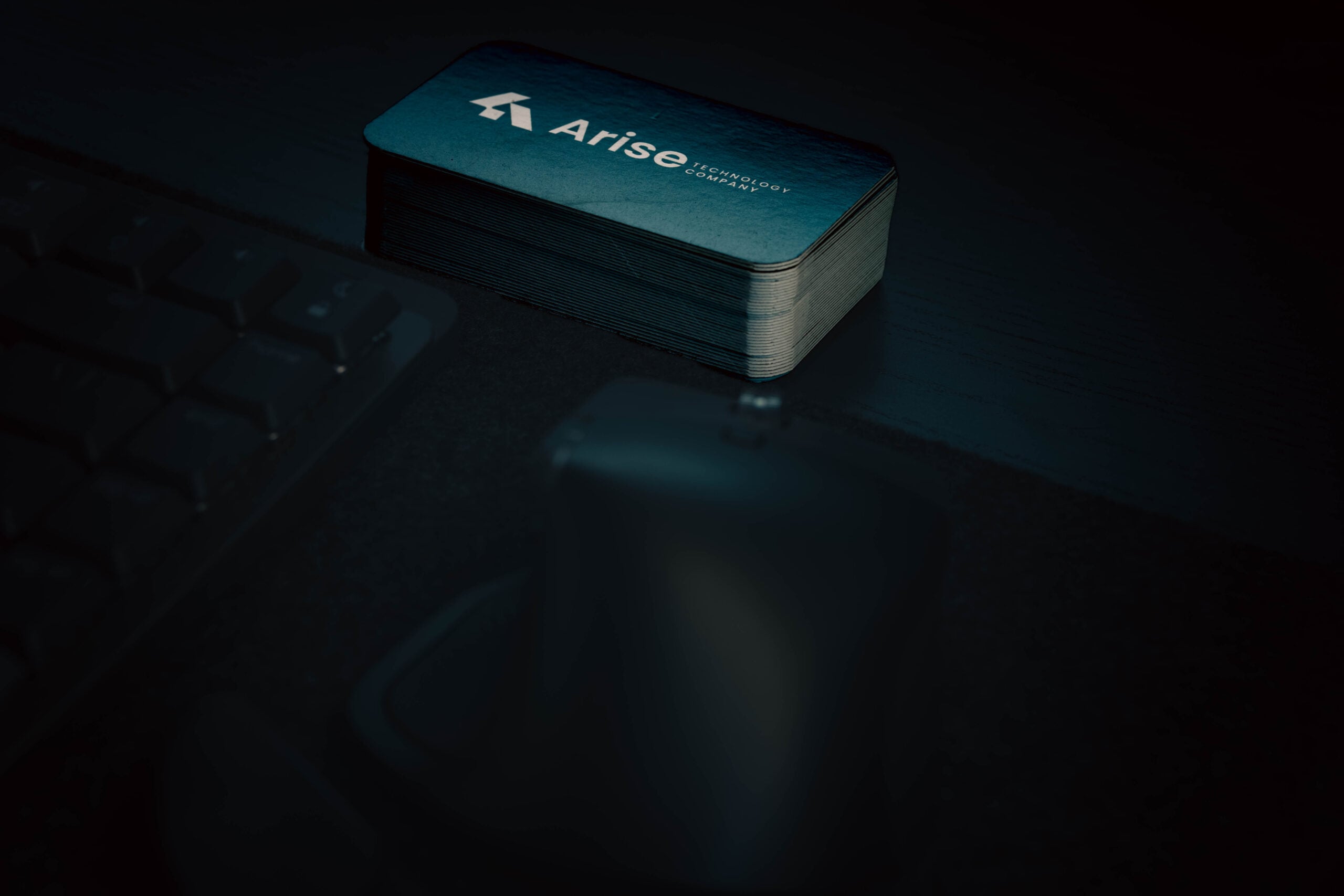 Arise Technology Company business cards.